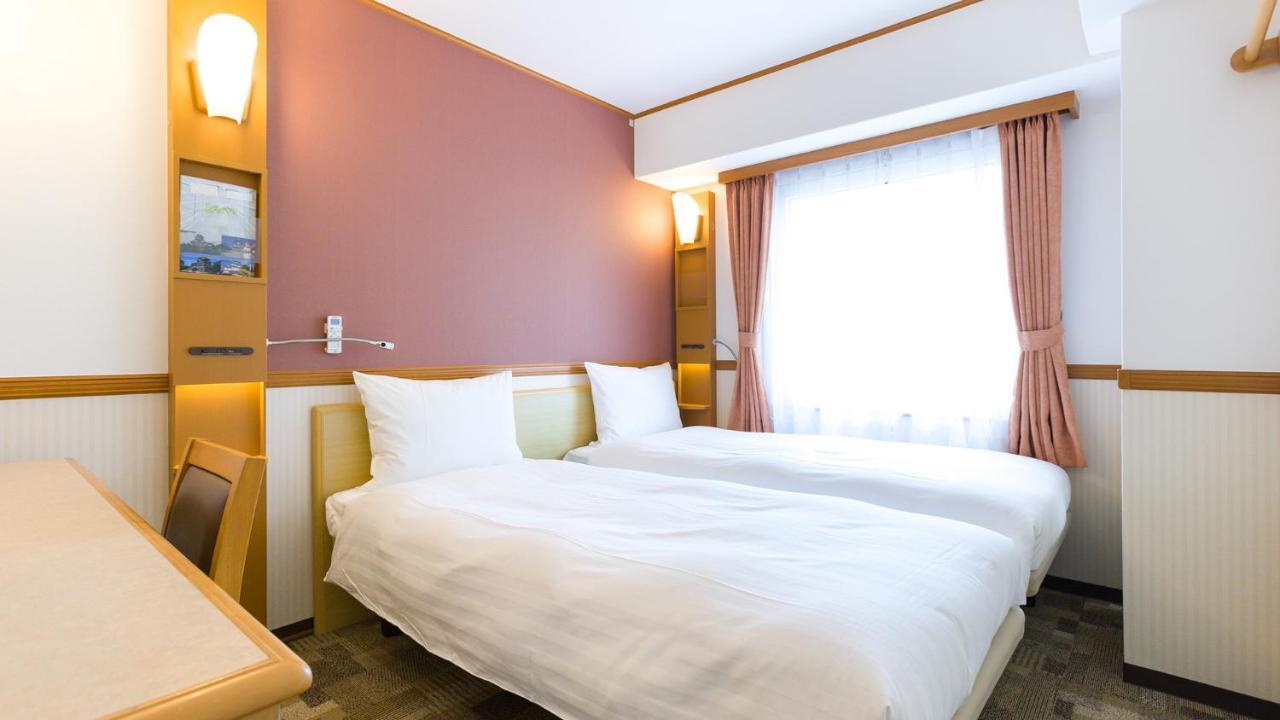 Toyoko Inn Tokyo Shinagawa-Eki Takanawa-Guchi Экстерьер фото