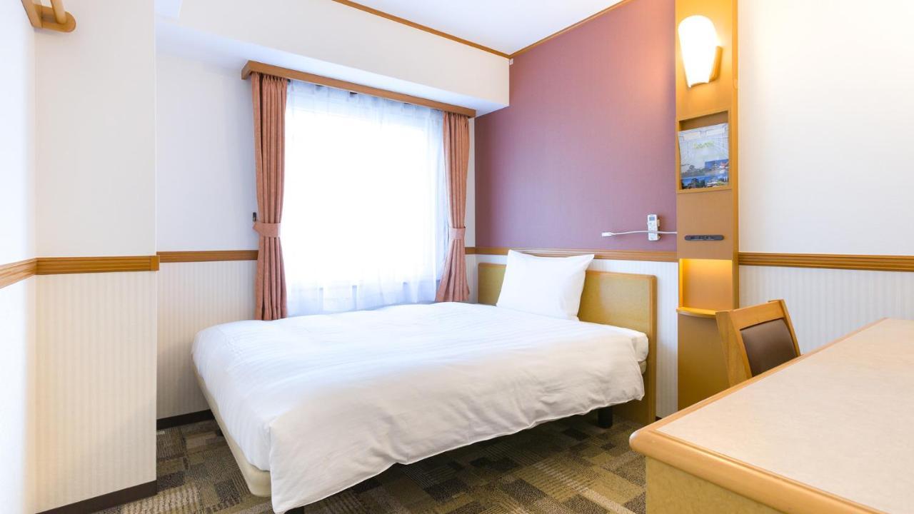 Toyoko Inn Tokyo Shinagawa-Eki Takanawa-Guchi Экстерьер фото