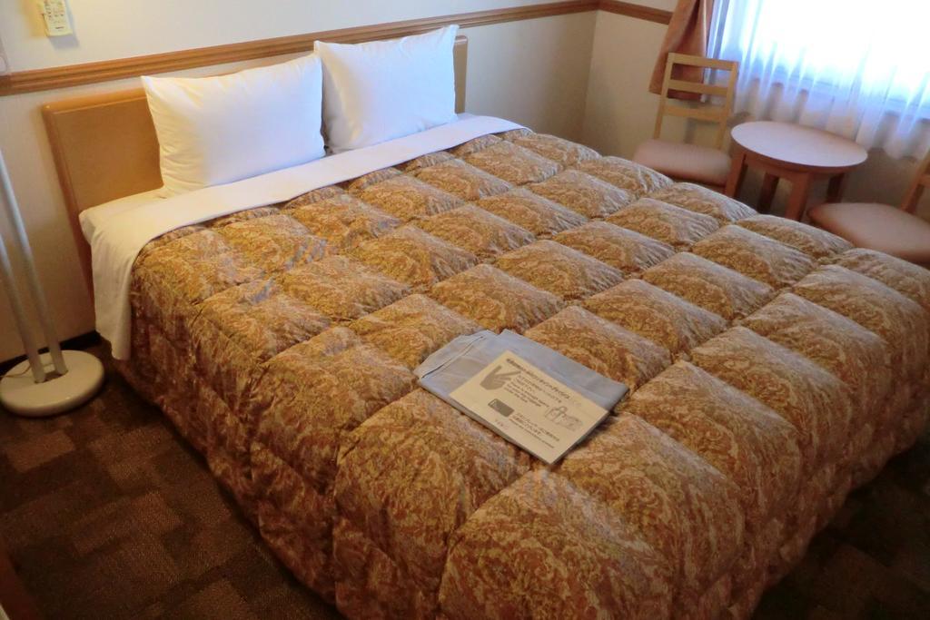 Toyoko Inn Tokyo Shinagawa-Eki Takanawa-Guchi Экстерьер фото