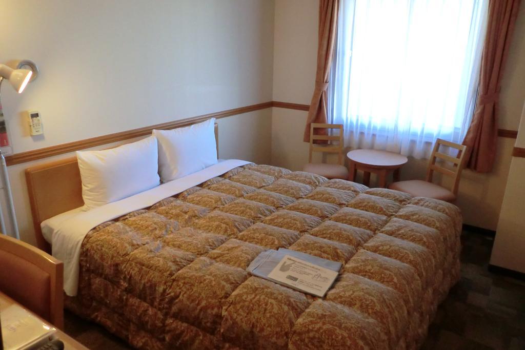 Toyoko Inn Tokyo Shinagawa-Eki Takanawa-Guchi Экстерьер фото